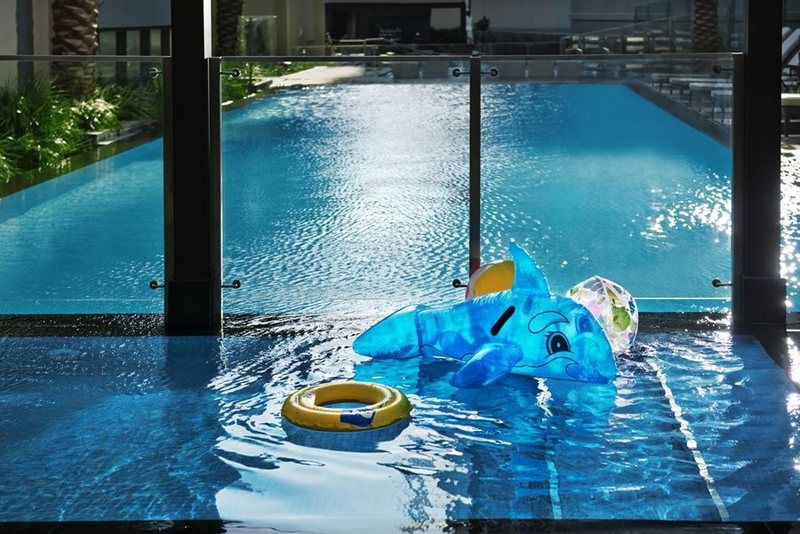 الشقق الفندقية دبيفي  داماك مايسون ذي فوغ المظهر الخارجي الصورة The swimming pool at the Ritz-Carlton, Singapore