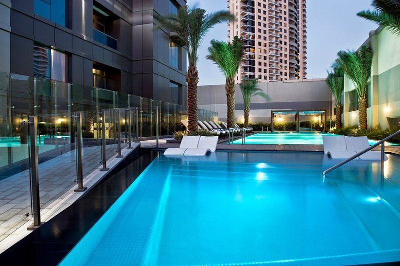 الشقق الفندقية دبيفي  داماك مايسون ذي فوغ المظهر الخارجي الصورة The swimming pool at the Address Downtown
