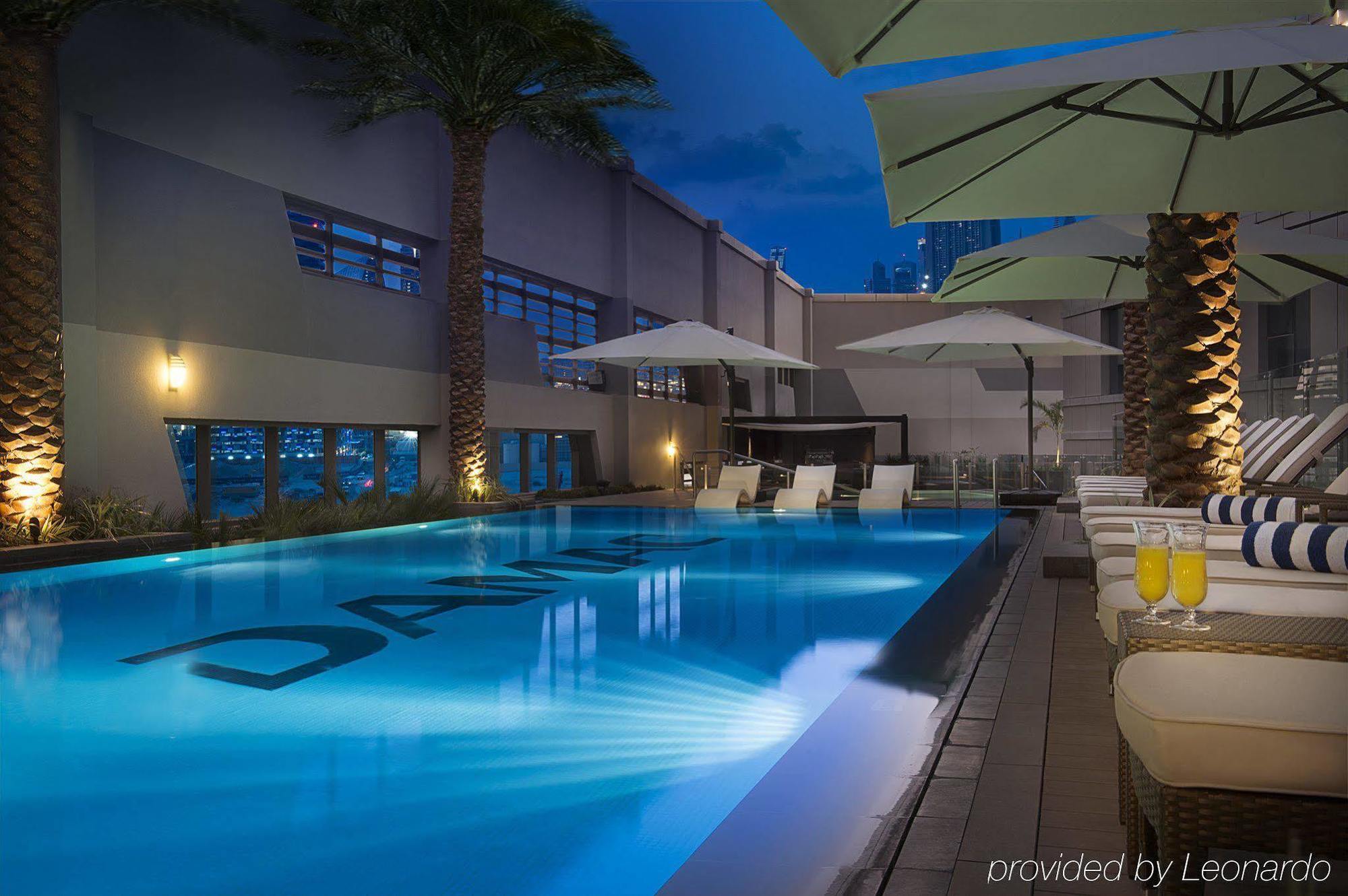 الشقق الفندقية دبيفي  داماك مايسون ذي فوغ المظهر الخارجي الصورة The pool at the hotel