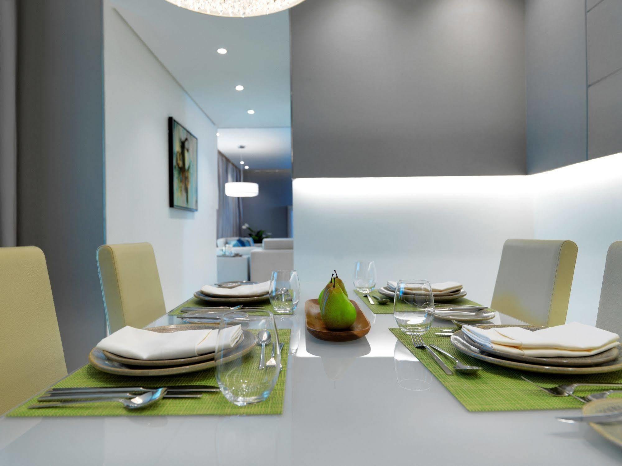الشقق الفندقية دبيفي  داماك مايسون ذي فوغ المظهر الخارجي الصورة A dining room