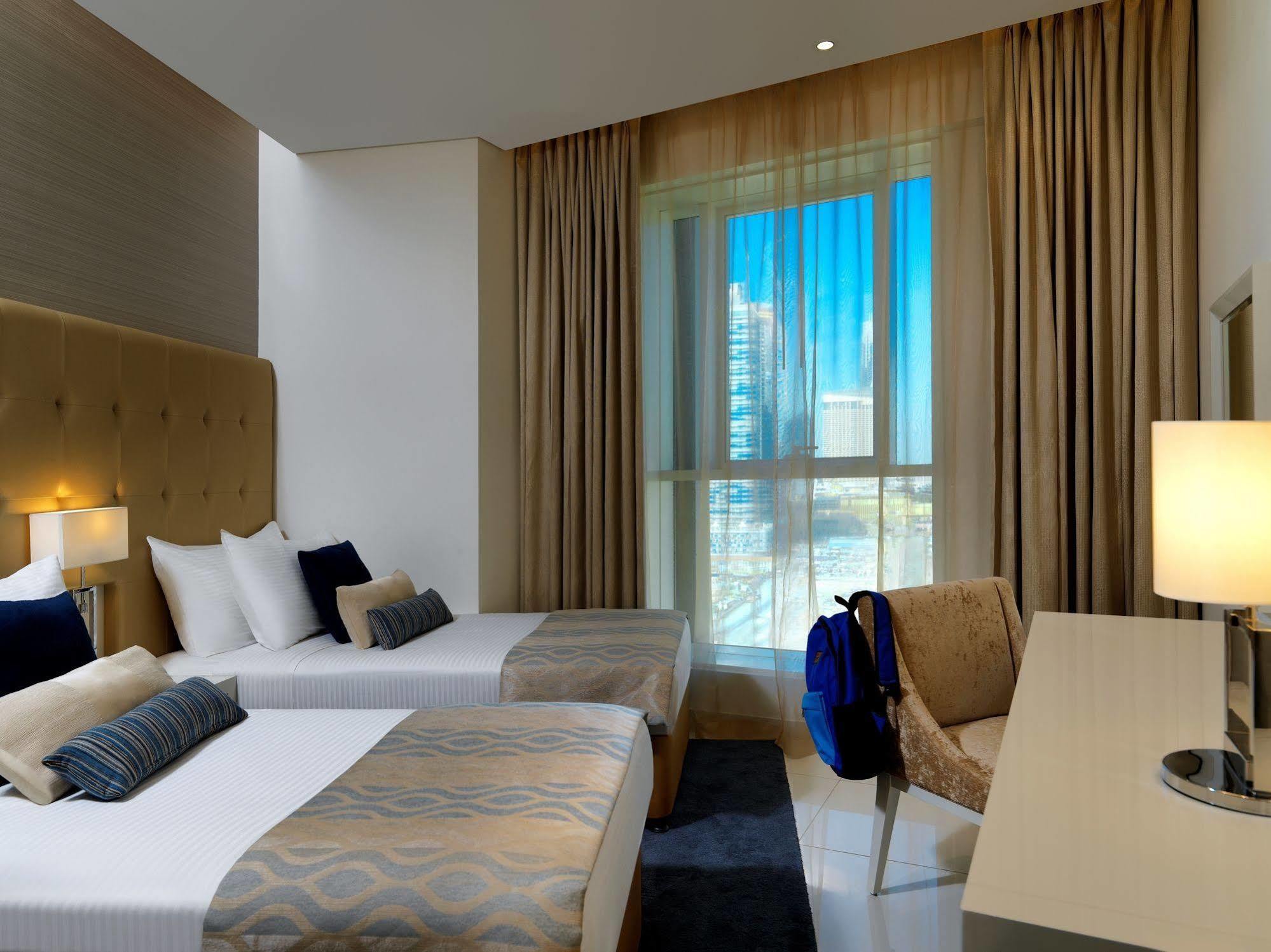 الشقق الفندقية دبيفي  داماك مايسون ذي فوغ المظهر الخارجي الصورة A room at the hotel