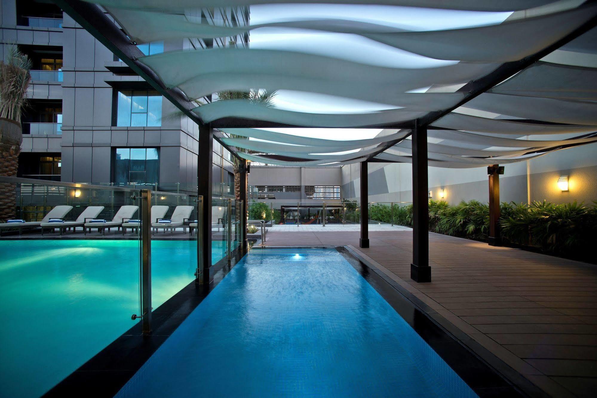 الشقق الفندقية دبيفي  داماك مايسون ذي فوغ المظهر الخارجي الصورة The swimming pool at the hotel